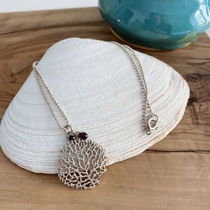 Silver dipped coral necklace with garnet stone